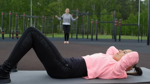 Caucasian Girl Doing Ab Crunches And Twi 