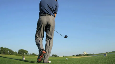 Caucasian golfer teeing off at start game golf commercial advert Stock Footage