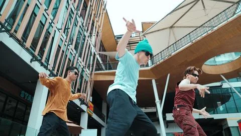 Caucasian group practice break dancing together. Low angle view. Endeavor. 스톡 사진