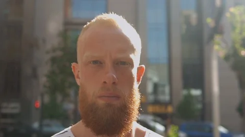 Caucasian guy going outdoors Stock Footage 90712074