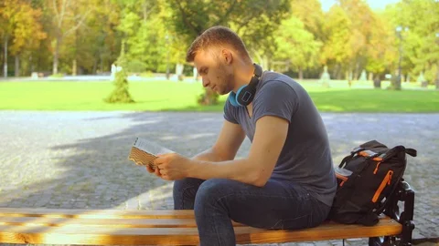 Caucasian guy resting at the open air Stock Footage 117413600