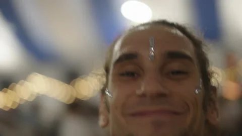 Caucasian guy smiling and staring at the camera while dancing Video stock 221543091