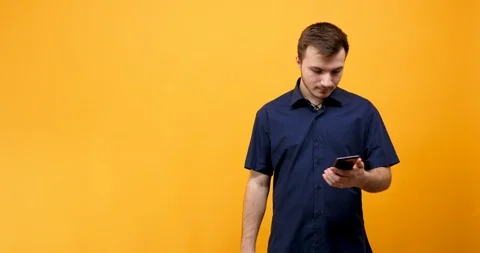 Caucasian guy taking a selfie with his smartphone Stock Footage 102443167