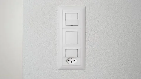 Caucasian hand is pressing button to roll up the shutter in a modern house. Vidéo 147850165