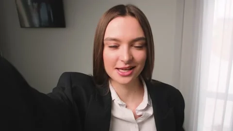 Caucasian influence holding camera for vlogging at home, or doing video call Stock Footage 150170232