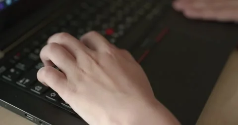 Caucasian kid hands type on keyboard. Boy use laptop computer. 4K 10-bit Stock Footage 345222537