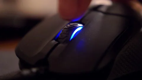 Caucasian Male Hand Using Computer Mouse Buttons and Wheel in the Dark Close Up Stock Footage 145261830