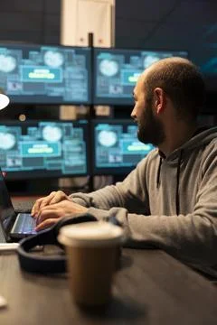 Caucasian Male Night Shift Coder Reviewing System Data 스톡 사진
