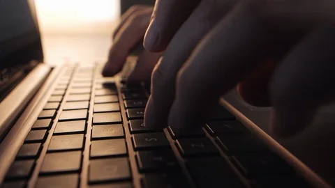 Caucasian male typing on keyboard working from home in covid-19 self isolation Stock Footage 127018341