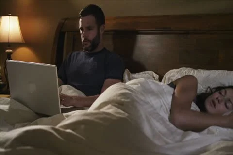 Caucasian Male Working In Bed Night Surprised Stock Footage