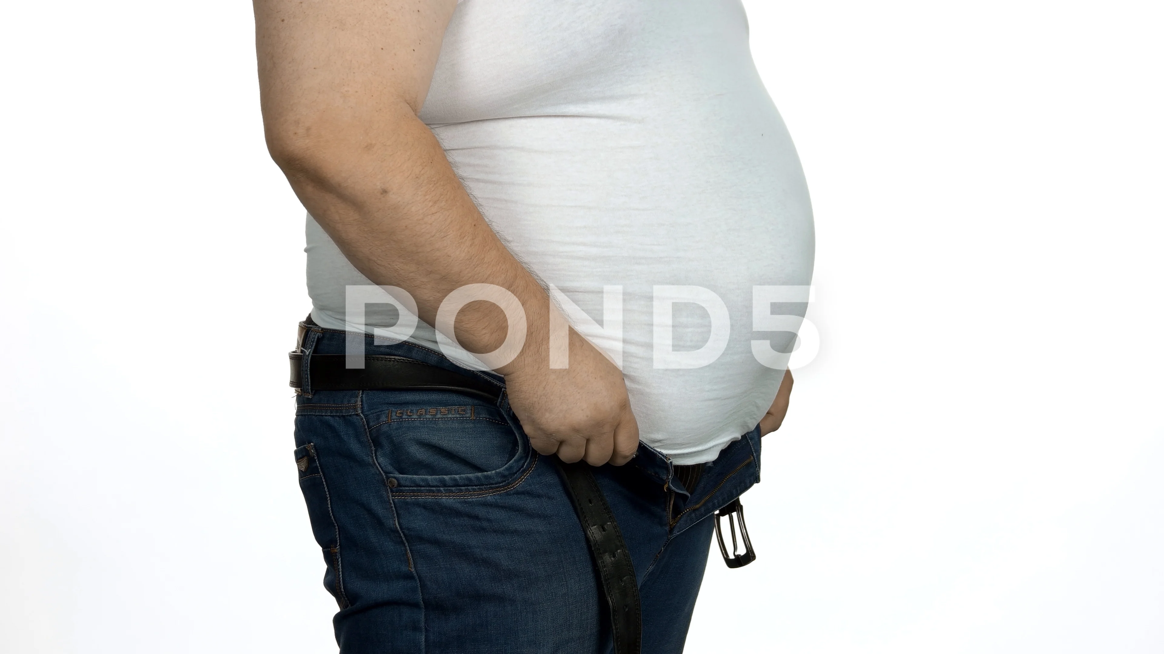 Caucasian man with big belly, side view.