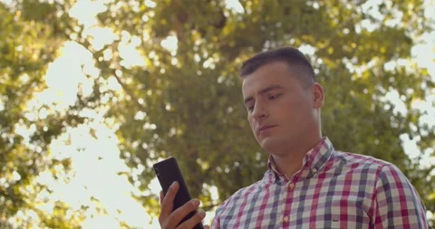 Caucasian man calling for help by phone to emergency service, close up slow Видео 134165847