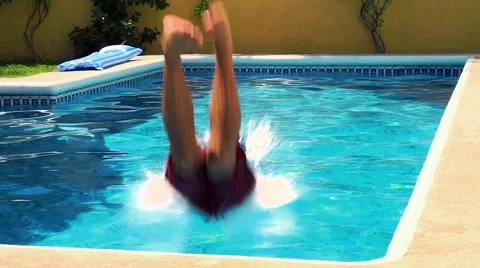 Caucasian man diving in a pool Stock Footage 60691941