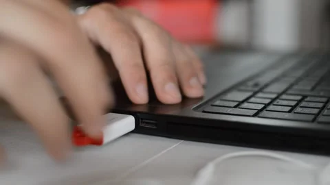 Caucasian man eject usb drive data storage on the laptop 스톡 동영상 196922262