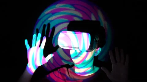 Caucasian man experiencing virtual reality, playing video games using vr headset Stock Footage 86822596