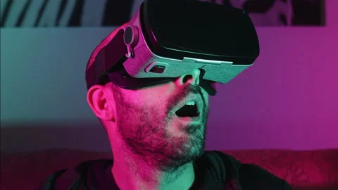 Caucasian man exploring in virtual augmented reality in the Metaverse Stock Footage 165685130