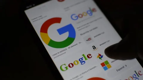 Caucasian man look for google logo, google internet on smartphone Stock-Footage 170358317