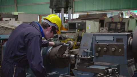 Caucasian man machine technician perform mechanical check to perfection of work Stock Footage 196437356