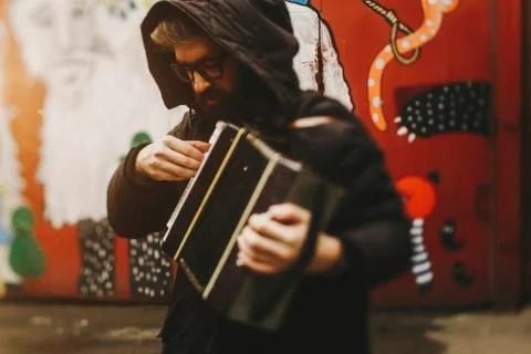 Caucasian man playing accordion Stock Photos