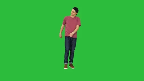 Caucasian man rapper does some stylish light dancing on a Green Screen, Chroma Stock Footage 115212830