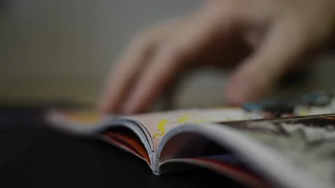 Caucasian man read comic book of superhero. hero comic book. Stock-Footage 237064586