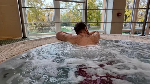 Caucasian Man Relaxing in Jacuzzi Stock Footage 293243727