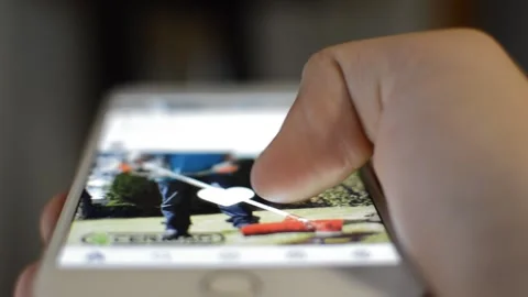 Caucasian man scroll iphone display. scroll instagram social network. 스톡 동영상 241315220