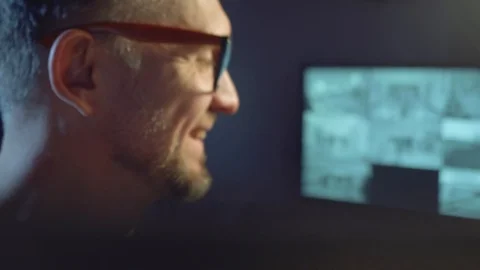 Caucasian man talks laughs and starts looking at screen of laptop with woman Stock Footage 101288841