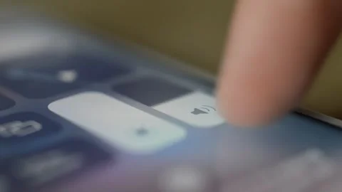 Caucasian man turn off volume and mute iphone. iphone setting. Stock Footage 254065720