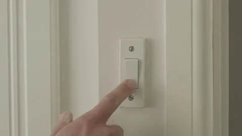 A Caucasian Man turning on multiple light switches Video stock 74509799