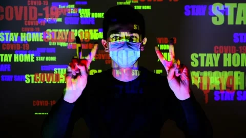 Caucasian man two hands shows a peace sign fingers. Young guy with protective me Stock Footage 130249684