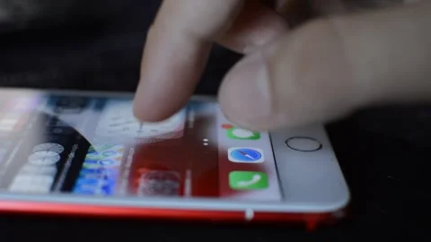 Caucasian man unlock iphone display screen. iphone screen swipe. Stock Footage 248685901