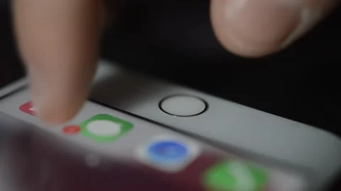 Caucasian man unlock iphone screen with touch id identification. Stock Footage 234194257