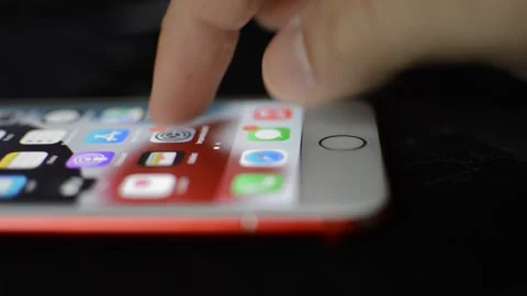 Caucasian man unlock iphone with touch id. iphone display swipe. Stock Footage 239315882