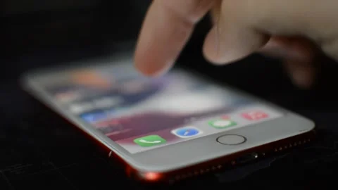 Caucasian man unlock iphone with touch id. iphone display swipe. Stock Footage 239316459