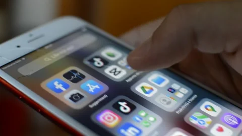 Caucasian man use iphone display. iphone screen by apple. Stock-Footage 248686720