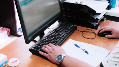 Caucasian man using desktop computer in office, hand mouse click Stock Footage 157488558