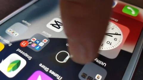 Caucasian man using iphone device. iphone display screen. Video stock 247181136