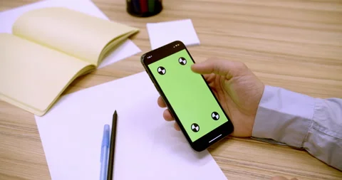 Caucasian man using mobile phone vertical green screen Stock Footage 170635539