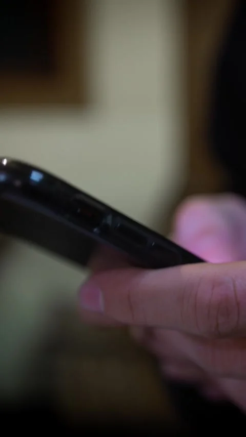  Caucasian man using a mobile. Touch screen smartphone in the restaurant Stock Footage 317261084