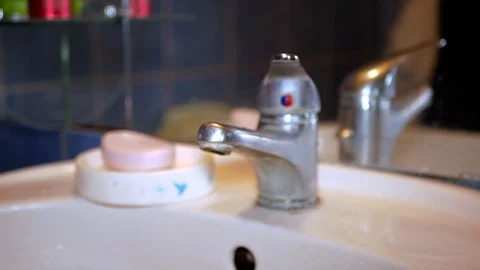 Caucasian man washing hands using soap Stock Footage 112659351