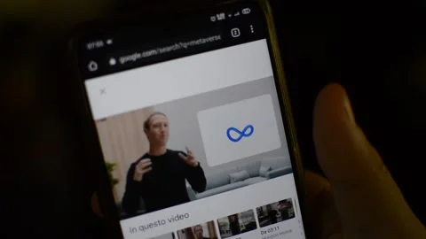 Caucasian man watch Mark zuckerberg talk about metaverse on internet Stock Footage