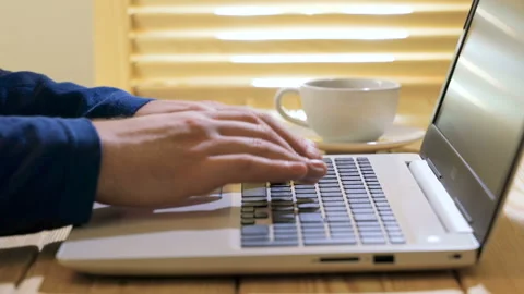 Caucasian man is working on laptop computer at style loft office. Stock Footage 105003009