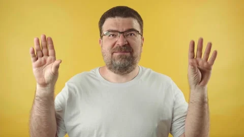 Caucasian middle aged man with beard showing blah blah blah gesture Stock Footage 156745694