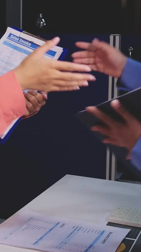 Caucasian middle aged man shaking hands with Caucasian young adult woman du.. Stock Footage 341615246
