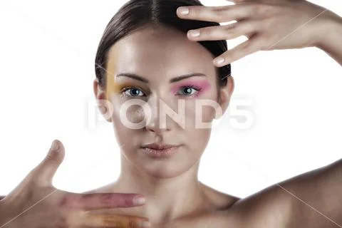 Caucasian model with great skin tries new poses for a beauty cosmetic line Stock Photos