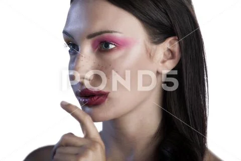 Caucasian model with great skin tries new poses for a beauty cosmetic line Stock Photos