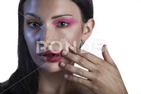 Caucasian model with great skin tries new poses for a beauty cosmetic line Stock Photos