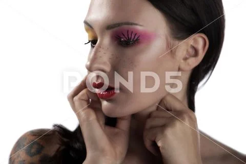 Caucasian model with great skin tries new poses for a beauty cosmetic line Stock Photos
