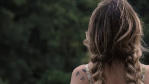 Caucasian model looking over forest viewpoint and smiling in slow motion. 스톡 동영상 123708631